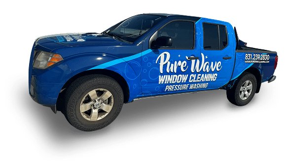 Blue truck with window cleaning advertisement.